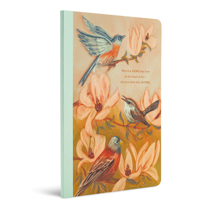 There's a Song that Lives at the Heart of Her Notebook