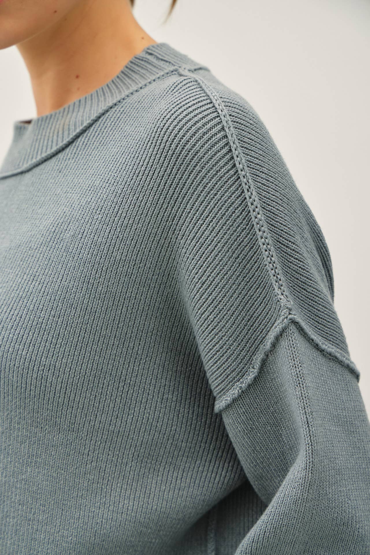 RIBBED KNIT SWEATER WITH RAW SEAM DETAILS, 2 colors