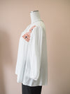 Tribal White Blouse with Embroidered Floral detail and Tassel